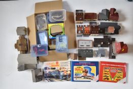 A collection of Hornby and similar 00 gauge model railway buildings, accessories and reference