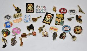 Thirty-three enamel and similar music related badges including Motorhead, AC/DC, Michael Jackson,