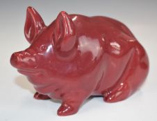 Robert Heron and Sons Wemyss Ware pottery pig decorated with a flambé/burgundy glaze, H10.5 x L19cm