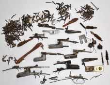 A large collection of shotgun parts including actions, locks, hammers etc.  PLEASE NOTE THAT A VALID