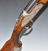 Rizzini 12 bore over and under ejector shotgun with engraved sidelock plates, trigger guard,