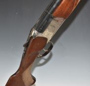 Baikal NK-27E 12 bore over and under ejector shotgun with engraved scenes of birds to the locks,