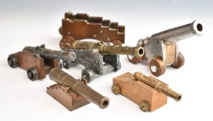 Five model cannon, one marked El Tigre to carriage, length 16cm and an extra carriage