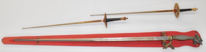 Oriental style sword with dragon head hilt and part decorated 77cm blade with mount, together with