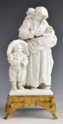 19thC Sevres white glazed figure of a woman with three children, raised on ormolu base, H19cm
