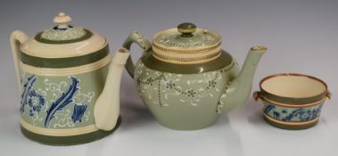 Two James Macintyre faience teapots and an unmarked twin handled sucrier, all decorated in the