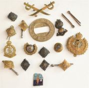 Small collection of metal Army badges and rank insignia, including Royal Engineers, Royal
