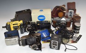 Cameras and binoculars to include Minolta 7000 35mm SLR body, Minolta AF-Sv, 1903 military Watson