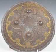 Islamic metal shield with brass decoration, retaining cloth liner, diameter 30cm