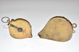 Two brass rotary percussion cap dispensers, both with belt loops, largest 11.5cm long.