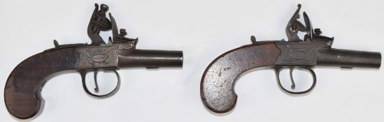 A pair of Dutton of London flintlock pocket pistols each with named and engraved lock, thumb-slide