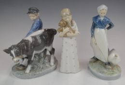 Three Copenhagen figures comprising Boy with Calf, Girl with Teddy and Girl with Goose, tallest