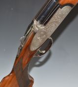Rizzini 12 bore over and under ejector shotgun with engraved sidelock plates, trigger guard,