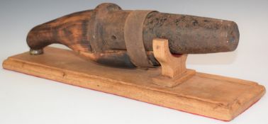 Iron barrelled hand gun or signalling cannon with carved wooden stock or handle, overall length