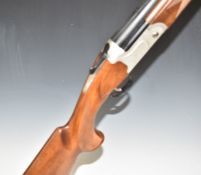 Kofs Sceptre SxE 12 bore over and under ejector shotgun with scrolling engraving to the lock and