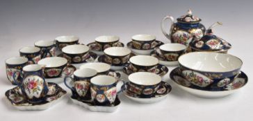 Approximately thirty three pieces of first period Worcester teaware, c1770, decorated with fan