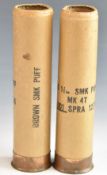 Two 1.5 bore paper cased shotgun cartridge cases marked 'SIG 1½ in SMK PUFF Mk 4T 001 SPRA 12/74'