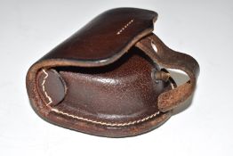 Vintage brown leather percussion cap pouch with belt loops.