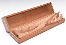 Mahogany cased set of draughtsman's French curves, length of box 44cm