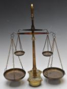 Spanish or similar double set of beam scales on brass base, height 38cm