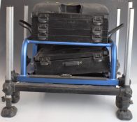 Preston Innovations multi layered fishing tackle seat full of accessories including swim feeders,