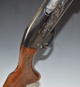 Remington model 1100 Sporter 12 bore 3-shot semi-automatic shotgun with ornately carved and