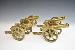 Set of four model cannon with brass barrels and carriages, bearing date 1812 to barrels, length