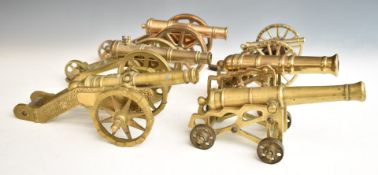 Six model cannon including a bronze example and one with coat of arms to top of barrel, length of