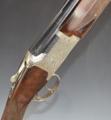 Winchester Grand European 12 bore over and under ejector shotgun with finely engraved locks,