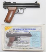 Benjamin Sheridan Model E9A .20 CO2 air pistol with shaped wooden grips and adjustable sights,
