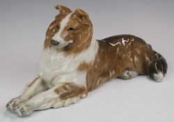 Royal Copenhagen reclining Collie no 1701, c1923-30, H13 x L29cm