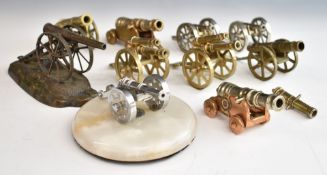 Eleven model cannon to include one on onyx or similar base, length of longest 16cm