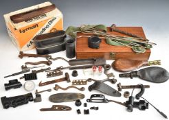 A collection of gun and shooting parts and accessories including cleaning kit, Lyman re-loading