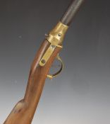 Carnival or fairground pop or cork gun with brass frame, trigger guard and butt plate, wooden ram-