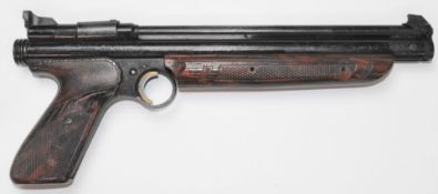 Crosman Model 1322 Medalist .22 target air pistol with shaped and chequered composite grip and