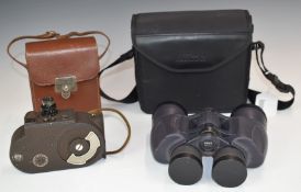 Bell & Howell film camera model 127-B and a pair of Nikon 8x40 Action Egret II binoculars