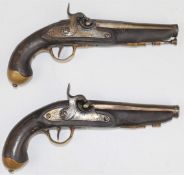 A pair of Eastern percussion converted from flintlock hammer action pistols, each with engraved lock