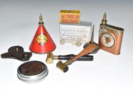 A collection of gun and shooting related accessories including shot or powder measures, Smith &