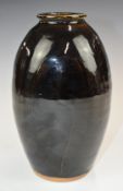 Bernard Leach St Ives studio pottery Tenmoku glazed vase of flattened form with incised willow