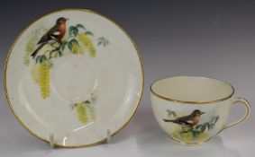 Royal Worcester cup and saucer decorated with a Bullfinch, signed Powell, H5.5cm
