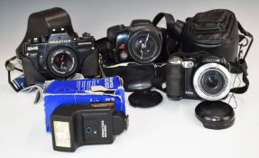Practika 35mm SLR BMS electronic camera together with a Fujifilm S8000fd digital camera, Chinon