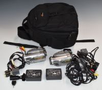 Four Panasonic VDR-D310 video camcorders, in two backpacks with instructions, chargers,