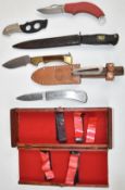 Six various knives including a Solingen example with serrated 13cm blade and sheath, Virginia with