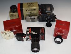 Canon T50 35mm SLR camera outfit including camera, fitted with Sigma 28mm 1:2.8 lens, Canon 50mm 1: