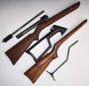 A collection of air rifle parts including BSA wooden stocks, Webley & Scott barrel etc.