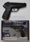 Gamo P-25 Blowback .177 air pistol with extra magazine, serial number 14F19146, in original box.