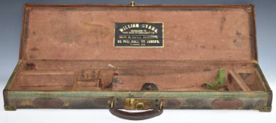 Leather and canvas bound shotgun carry case with 'William Evans Gunmakers to H.R.H. Duke of