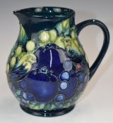 Moorcroft pedestal jug decorated in the Finches pattern, H14.5cm