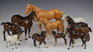 A collection of Beswick horses including palomino and grey colourways, H22cm
