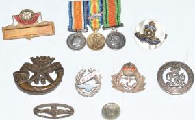 WW1 silver War Badge number 383394, silver and enamel Royal Navy badge and mother of pearl and